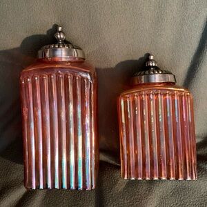 Beautiful heavyweight orange ribbed glass canisters. Both 4 1/2” x 4 1/2”.